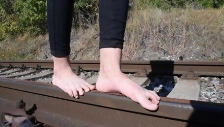 Barefoot walking and dirty feet on rails (long toes, bare feet, foot tease, sexy feet, public feet)